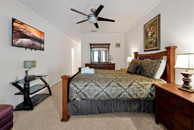 Building Photo - "Stunning 3BR Orlando Home with Private Screened Pool, Spa & Spacious Living Areas"