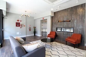 Building Photo - Room Available in Modern 2BR Condo – Jeffr...