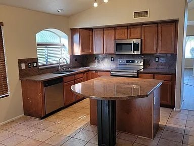 Building Photo - 10931 W Roanoke Ave