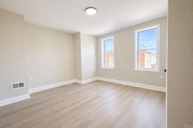 Building Photo - Modern 3BR Rowhome with Finished Lower Level & Rear Deck