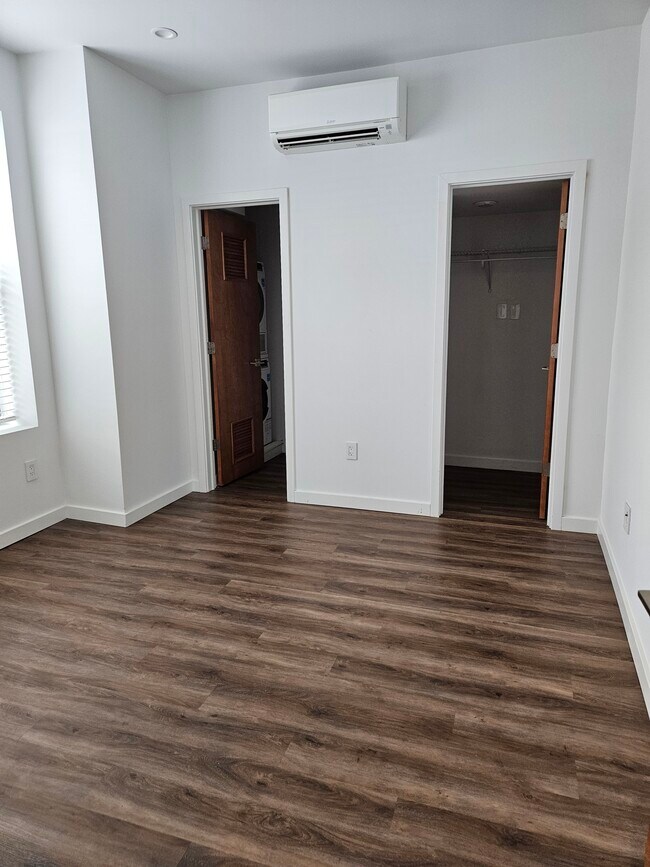 Bedroom with Closet and Laundry - The Lofts at 135