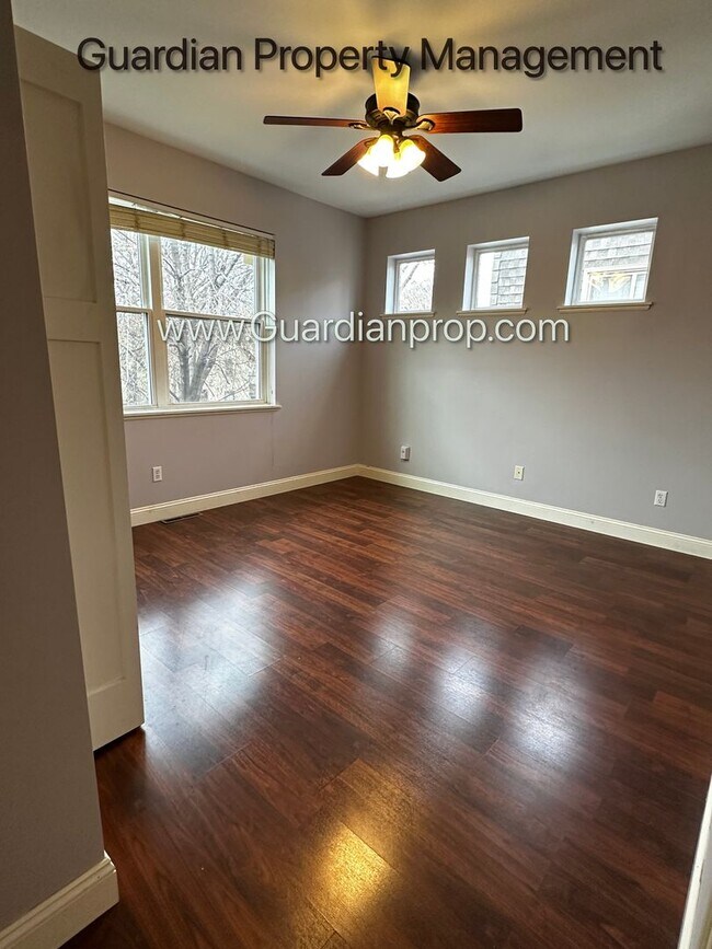 Building Photo - Spacious Uptown Side By Side, Dishwasher, Garage, In Unit Laundry, Private Rooftop Deck