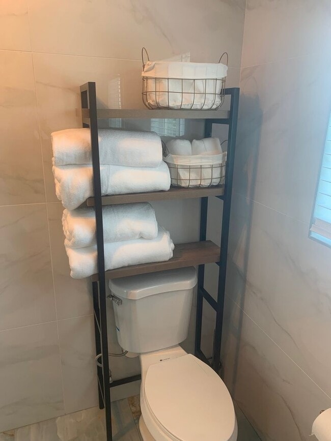 Building Photo - Furnished, Upstairs Apartment with 2 bedro...