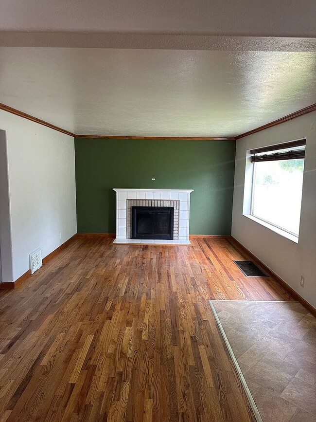 Building Photo - Ideally Located and Updated 4 Bed 2 Bath Fully-Fenced Home w/ Detached Garage/Shop!