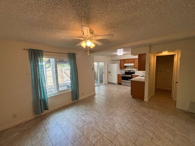 Building Photo - Spacious 4-Bedroom Townhome Directly Across from Greenfair Park