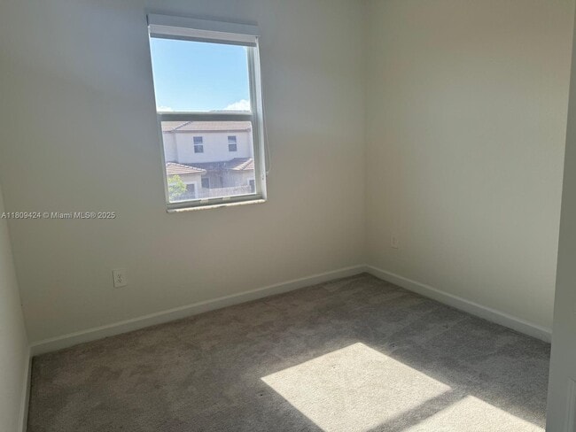 Building Photo - 26459 SW 149th Ave