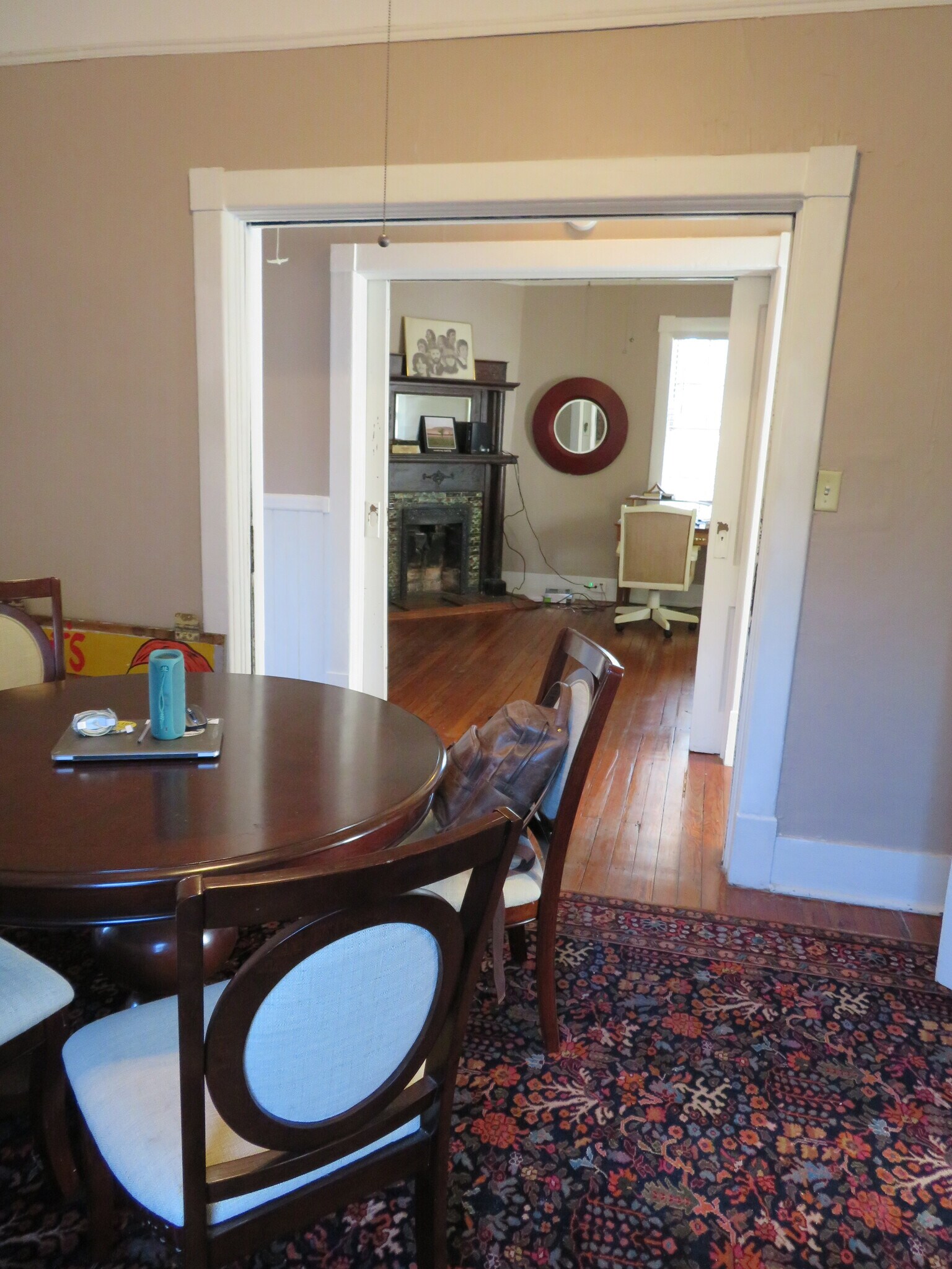 Occupied Back Parlor/Dining - View through pocket doors to Front Parlor/Living - 1217 Java Pl