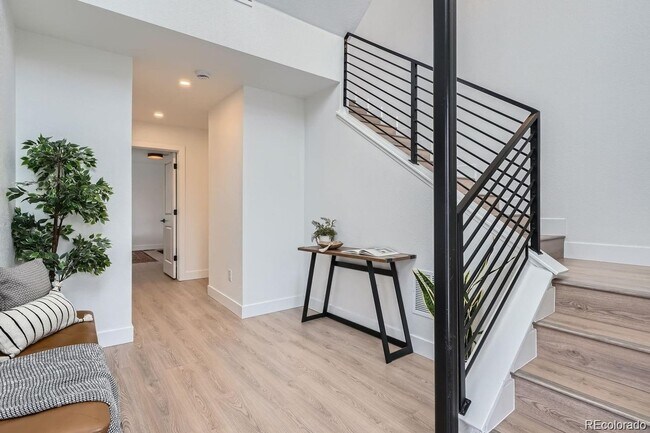 Building Photo - New Construction 3-Bedroom Townhome with Rooftop Deck & Mountain Views