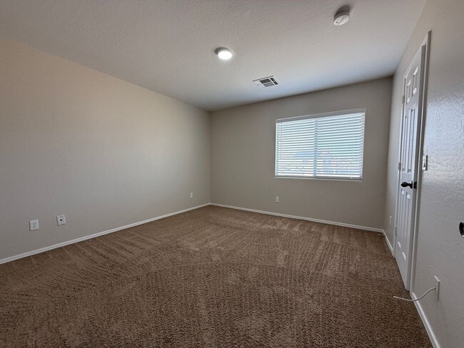 Building Photo - Buckeye, 4 bed, 2.5 bath, huge lot, across...