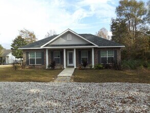 Building Photo - LAKEFRONT HOME