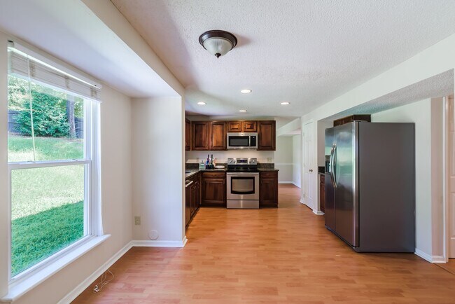 Building Photo - Spacious 3 bedroom home in desirable SW Durham! Super dog friendly with large fenced yard!