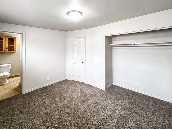 Building Photo - Spacious 5-Bedroom Home with Lofted Garage