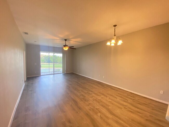 Building Photo - Beautiful 2/2 Condo in North Shore at Lake Hart – Golf Course Views & Available Now!