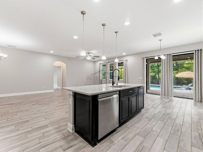 Building Photo - 8947 Garden Party Dr
