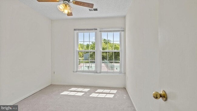Building Photo - This stunning 3-bedroom, 2-bathroom interior townhome is sure to impress.