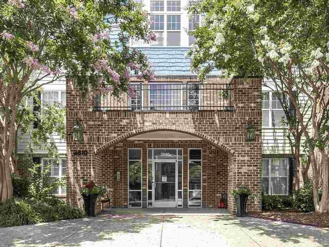 Building Photo - Spacious top-floor condo — 2BR/2BA with hardwood floors, electric fireplace & deposit-free move-i...