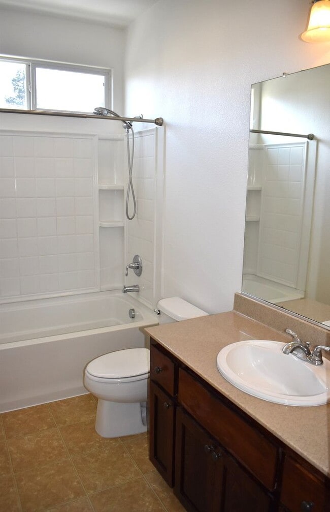 Building Photo - Great home with solar, centrally located n...