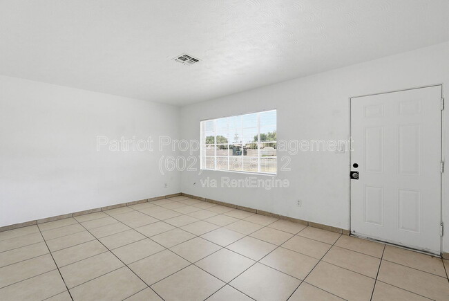Building Photo - 6701 N 33rd Ave