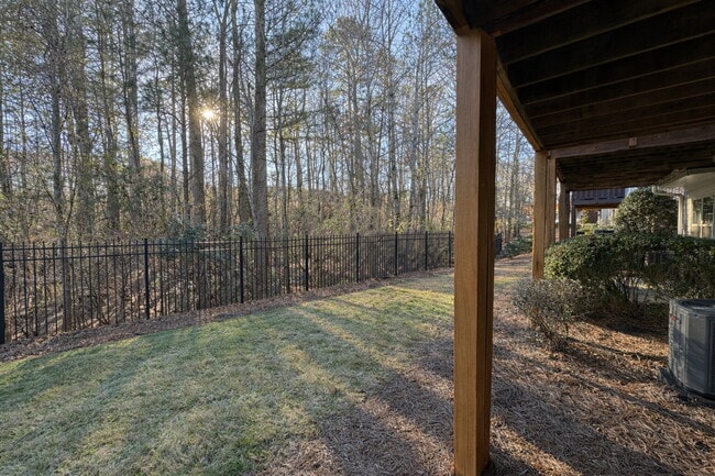 Building Photo - Gated Johns Creek Townhome Offering Space, Privacy, and Everyday Convenience