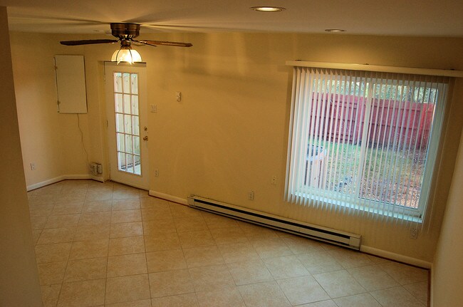 Downstairs family room and fenced yard - 2667 Chancer Dr