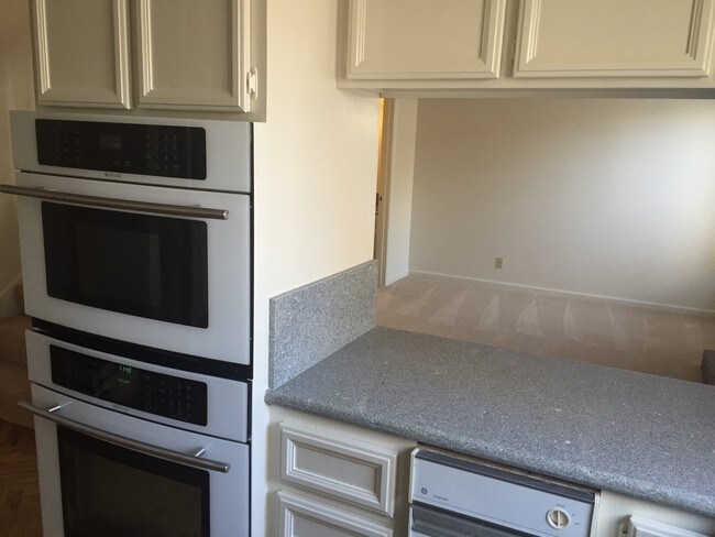 Kitchen to Family Room - open view - 385 S Bernardo Ave