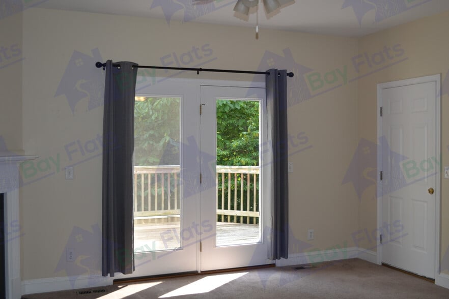 Living area with door. - 41195 Friendship Ct