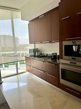 Building Photo - 15811 Collins Ave
