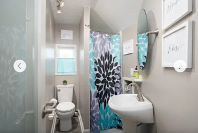 Building Photo - 4 Bedroom with a Hot Tub in the heart of t...
