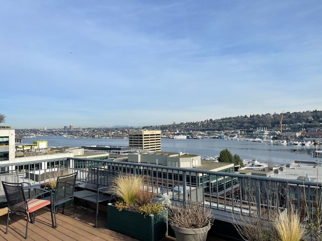 Building Photo - Updated Condo with Parking for One, Great Location and Communal Roof-top Deck!!