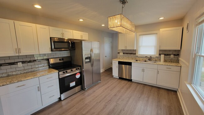 Building Photo - 3 Bedroom With A Finished Basement And Large Back Yard