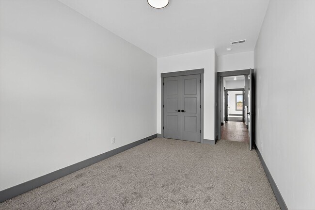 Building Photo - BRAND NEW3 BED 2.5 BATH TOWNHOME WITH 2 STALL GARAGE