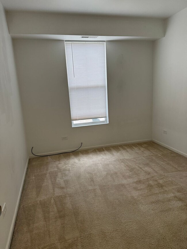 Building Photo - Partially Furnished - Bright & Spacious 2BR/1.5 BA CONDO - End-Unit w/ 2-Car Garage, Appliances, ...