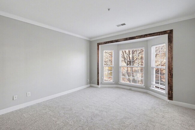 Building Photo - Spacious and light-filled second-story condo!