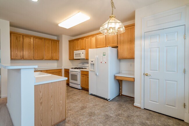 Building Photo - Sun-Filled And Spacious 3 Bedroom 2.5 Bath...