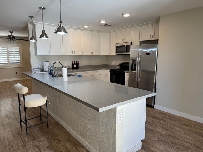 Building Photo - 4 bedroom basement home North Mesa