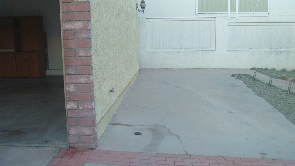 GUEST PARKING SPACE TO RIGHT OF 2 CAR GARAGE - 2106 Clark Ln