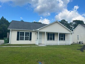 Building Photo - Freshley Painted! Updated Flooring! Pets o...