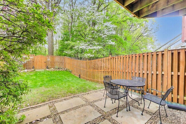 Building Photo - COMINGS SOON - Beautifully Updated Winchester-Built Townhome Backing to Serene Parkland.