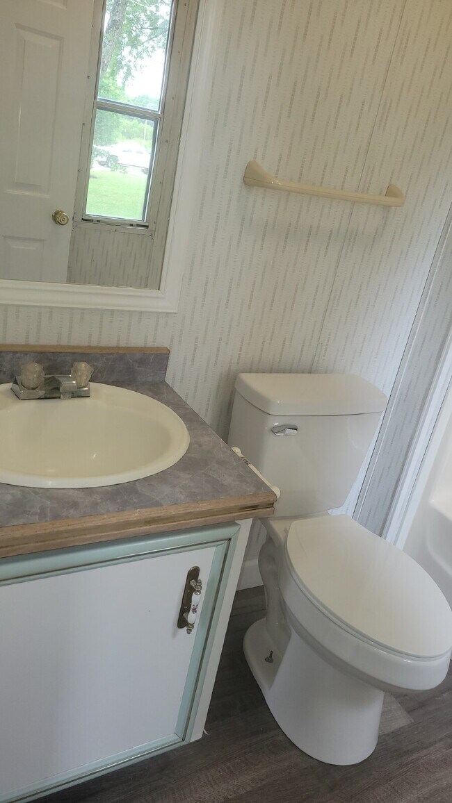 Building Photo - " 2-Bed, 2-Bath Mobile Home Retreat in Tan...
