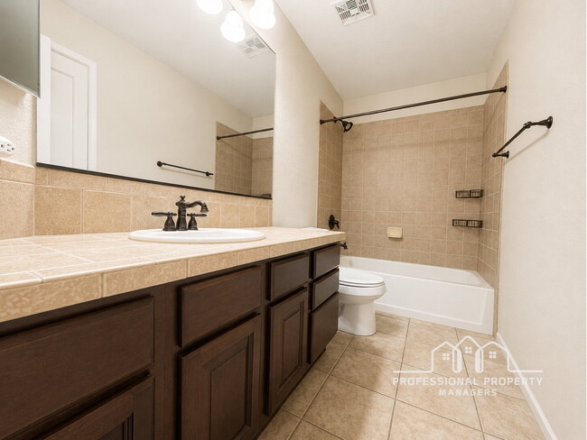 Building Photo - "Spacious 4-Bedroom, 2-Bathroom SOLAR Home in Mesa del Sol!"