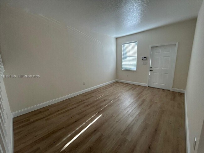 Building Photo - 12515 SW 124th Path