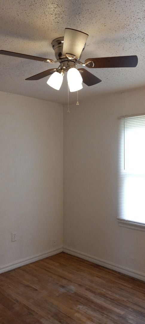 Building Photo - NEW listing-refinished hardwood floors, new laminate and paint throughout