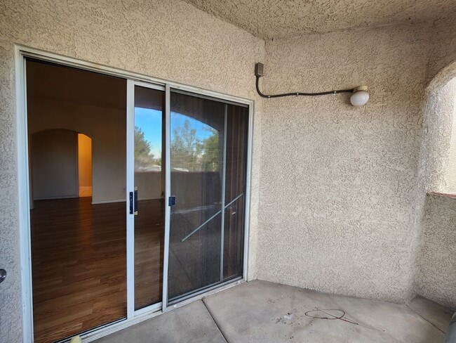 Building Photo - 2nd Story Condo in gated community close to the pool.