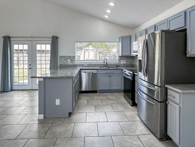 Building Photo - Charming 4-Bedroom with Modern Upgrades in Prime Location