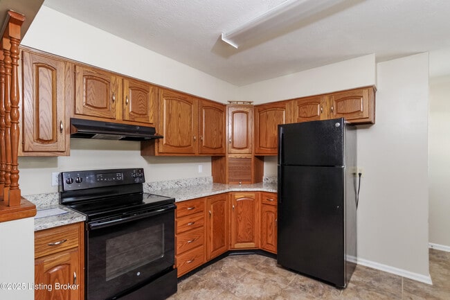 Building Photo - 8003 Canna Dr