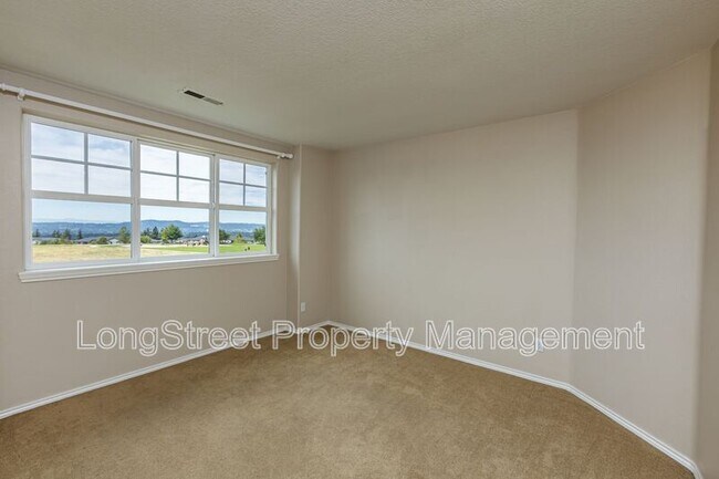 Building Photo - 8996 SE Bristol Park Dr