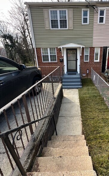 Front View With Carport - 5422 67th Ave