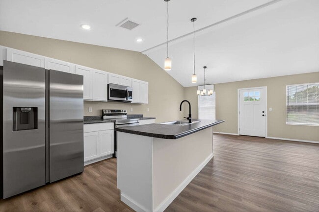 Building Photo - BRAND-NEW 4BR/2BA Duplex/Patio home with Garage - Available Now near Hollister, Schools