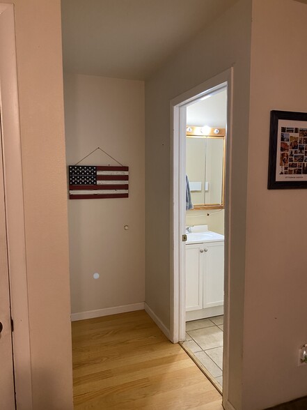 Hallway and half bath main floor - 1240 S Reed St