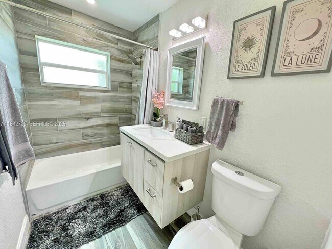 Building Photo - 5249 NE 3rd Ter.